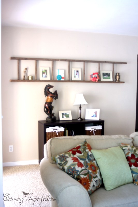 You'll never believe how easy it is to take an old piece an make a huge statement like this old ladder did. The wall was big and empty before, and now hold character and sentimentality.